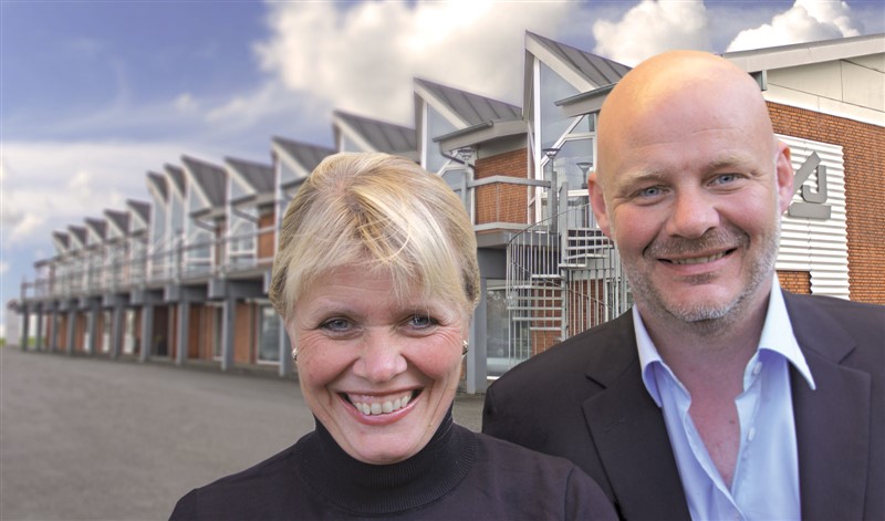 Siblings Gitte Clausen Bruun and Morten Jarne Clausen in front of the factory in Hjallerup